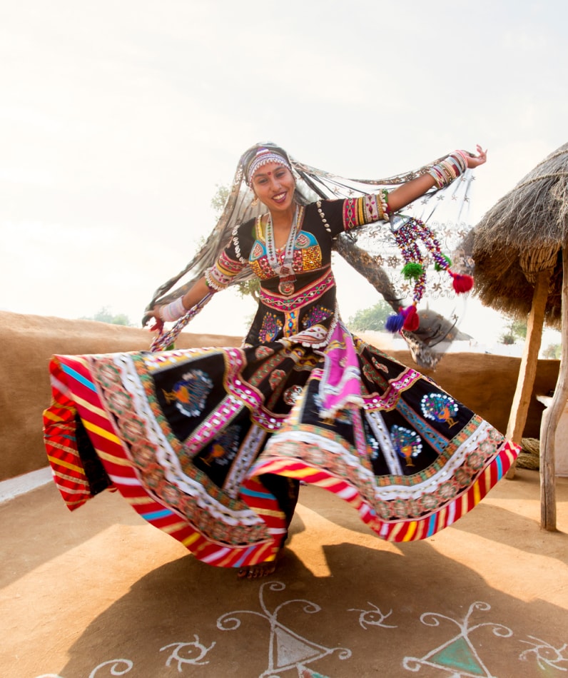 A girl dancing at a festival